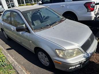 Silver Mitsubishi Lancer Sedan 2003
