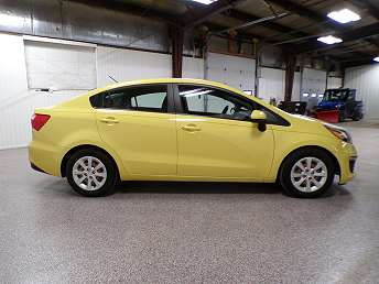Yellow Kia Rio Sedan 2016