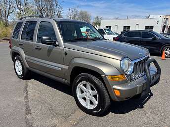 Beige Jeep Liberty SUV 2006
