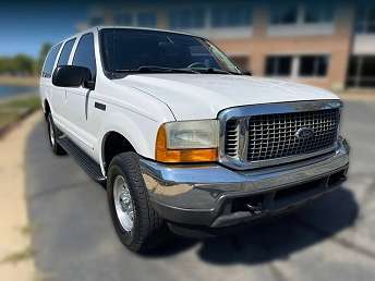 White Ford Excursion XLT 2000