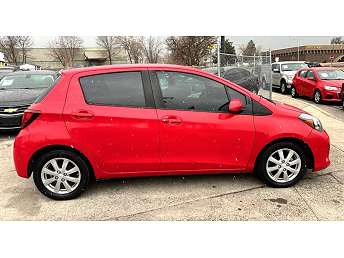 Red Toyota Yaris LE 2015