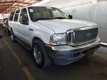 White Ford Excursion XLT 2000