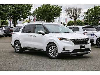 2024 White Minivan Kia Carnival