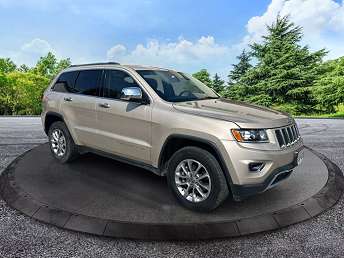 Beige 2015 Jeep Grand Cherokee SUV