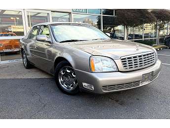 Gold Cadillac DeVille Sedan 2004