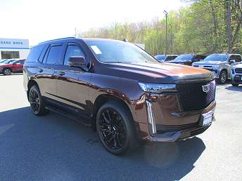 Brown Cadillac Escalade SUV 2023