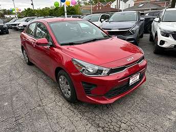 Red 2023 Kia Rio Sedan