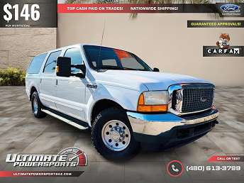 White Ford Excursion XLT 2000