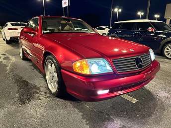 Mercedes W124 red (Maxichamps) 1:43