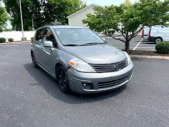 Silver Nissan Versa SL 2011